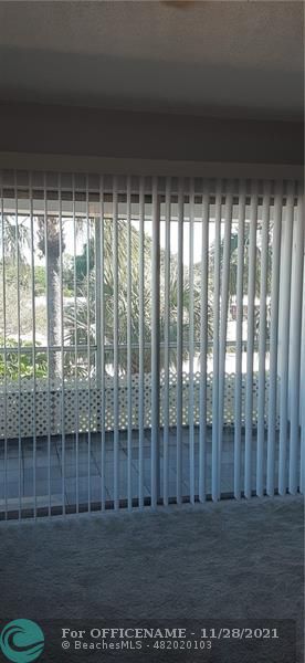 5800 Margate Boulevard Margate, FL 33063 - Photo 10 of 19 a view of wooden floor and a window