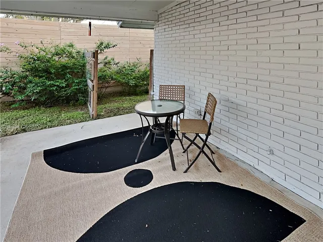a table and chairs in the patio