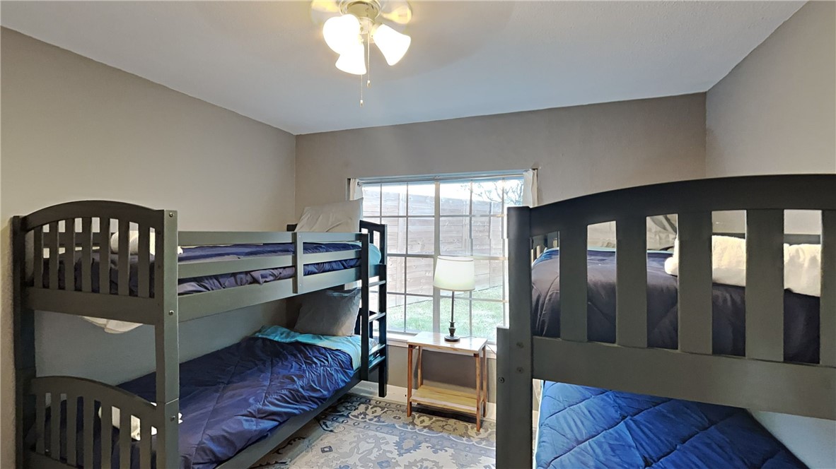 3554 Denver Avenue Corpus Christi, TX 78411 - Photo 20 of 21 a bedroom with furniture and a window