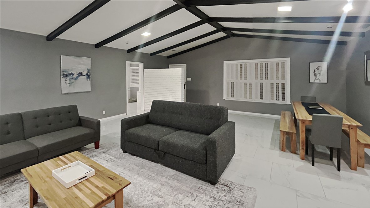 3554 Denver Avenue Corpus Christi, TX 78411 - Photo 5 of 21 a living room with furniture and a piano