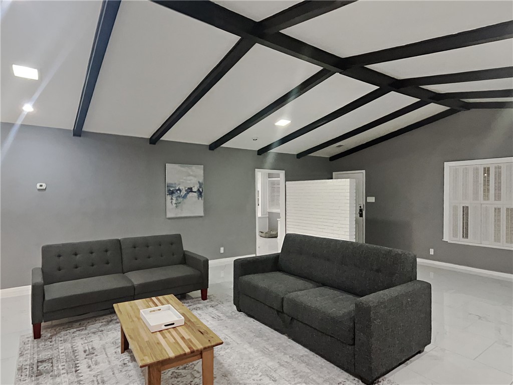 3554 Denver Avenue Corpus Christi, TX 78411 - Photo 6 of 21 a living room with furniture and a rug