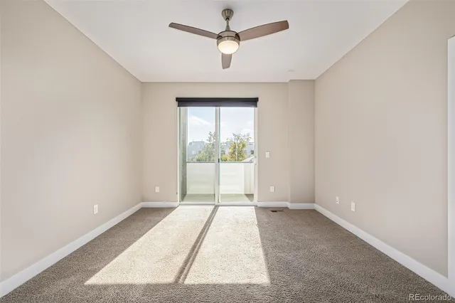a bathroom with a sink a toilet a mirror a bathtub and shower