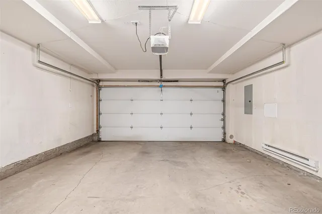 a picture of a bench in front of a wall