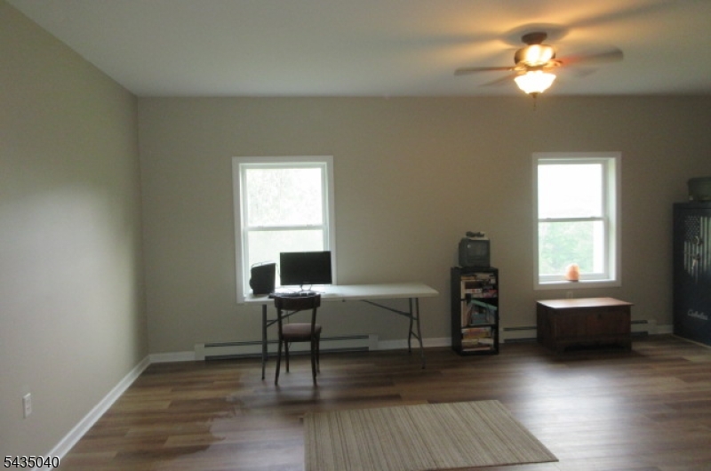 28 Beaver Run Road Lafayette, NJ 07848 - Photo 35 of 36 a living room with furniture and a window