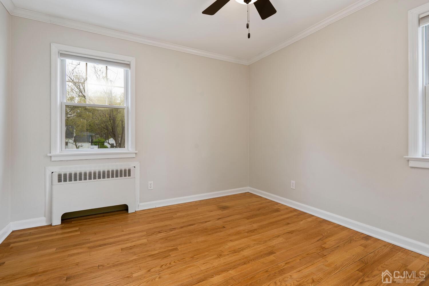 48 Lancaster Road Colonia, NJ 07067 - Photo 14 of 37 an empty room with a window