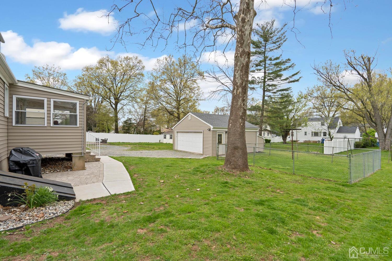 48 Lancaster Road Colonia, NJ 07067 - Photo 34 of 37 a view of a house with a yard