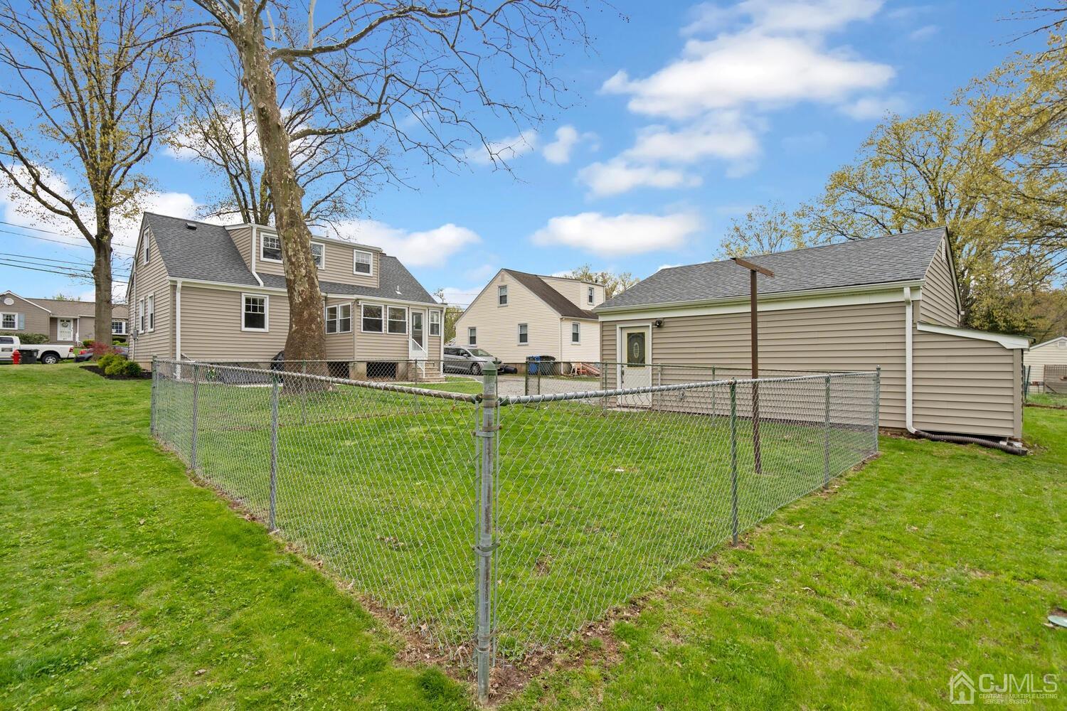 48 Lancaster Road Colonia, NJ 07067 - Photo 35 of 37 a view of a house with backyard