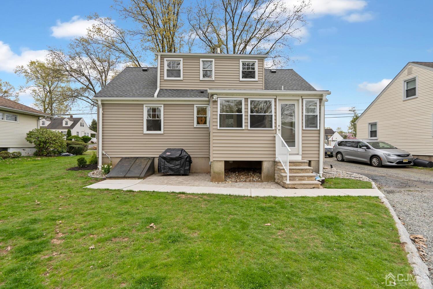 48 Lancaster Road Colonia, NJ 07067 - Photo 36 of 37 a view of a house with a yard