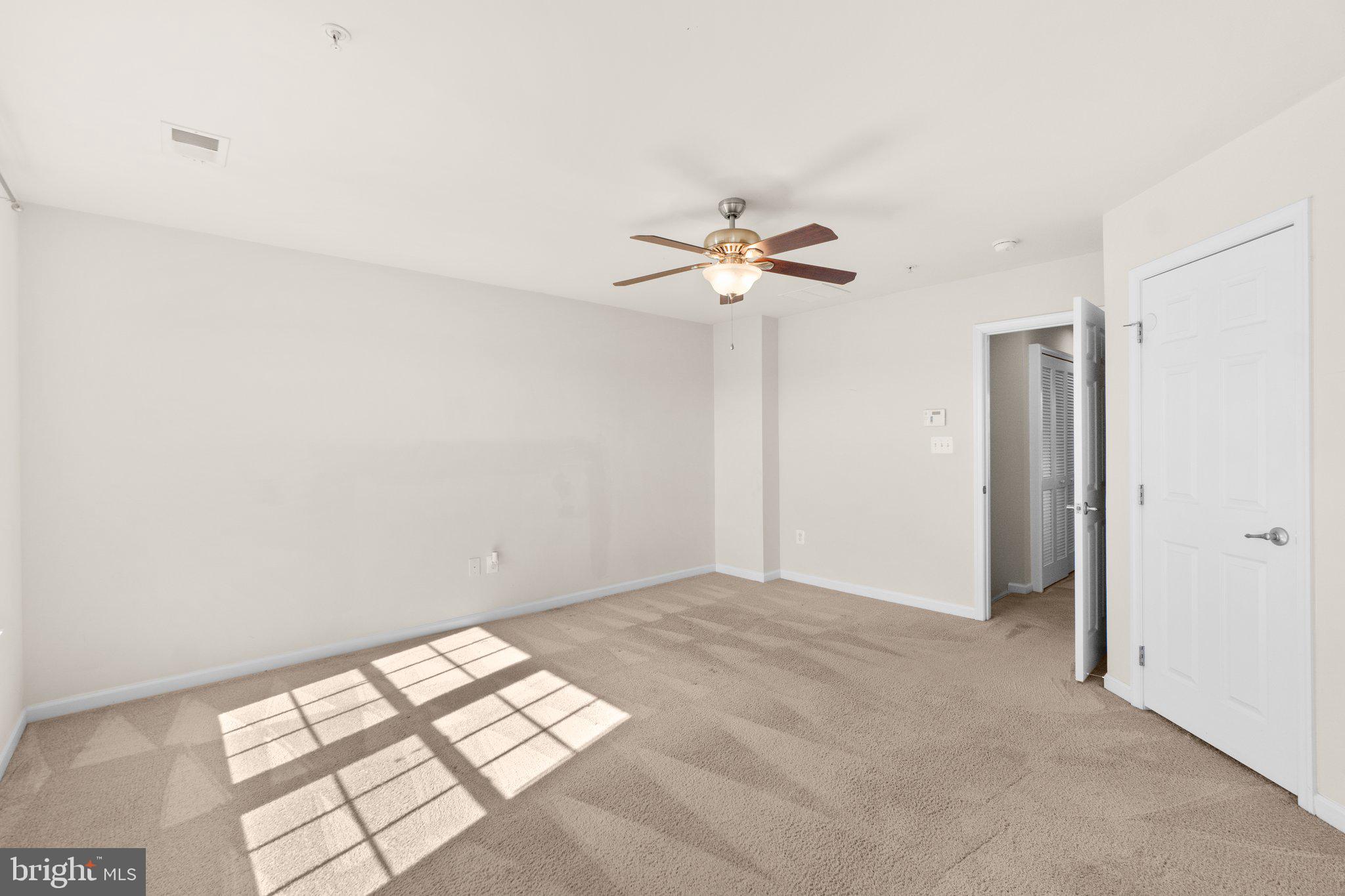 2061 Spring Run Circle Frederick, MD 21702 - Photo 18 of 42 a view of an empty room with a window