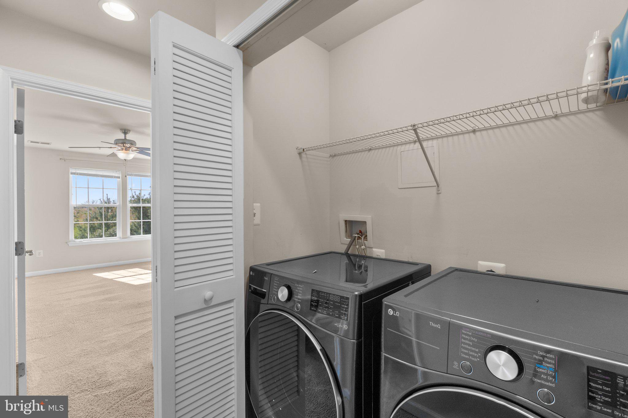 2061 Spring Run Circle Frederick, MD 21702 - Photo 22 of 42 a utility room with dryer and washer