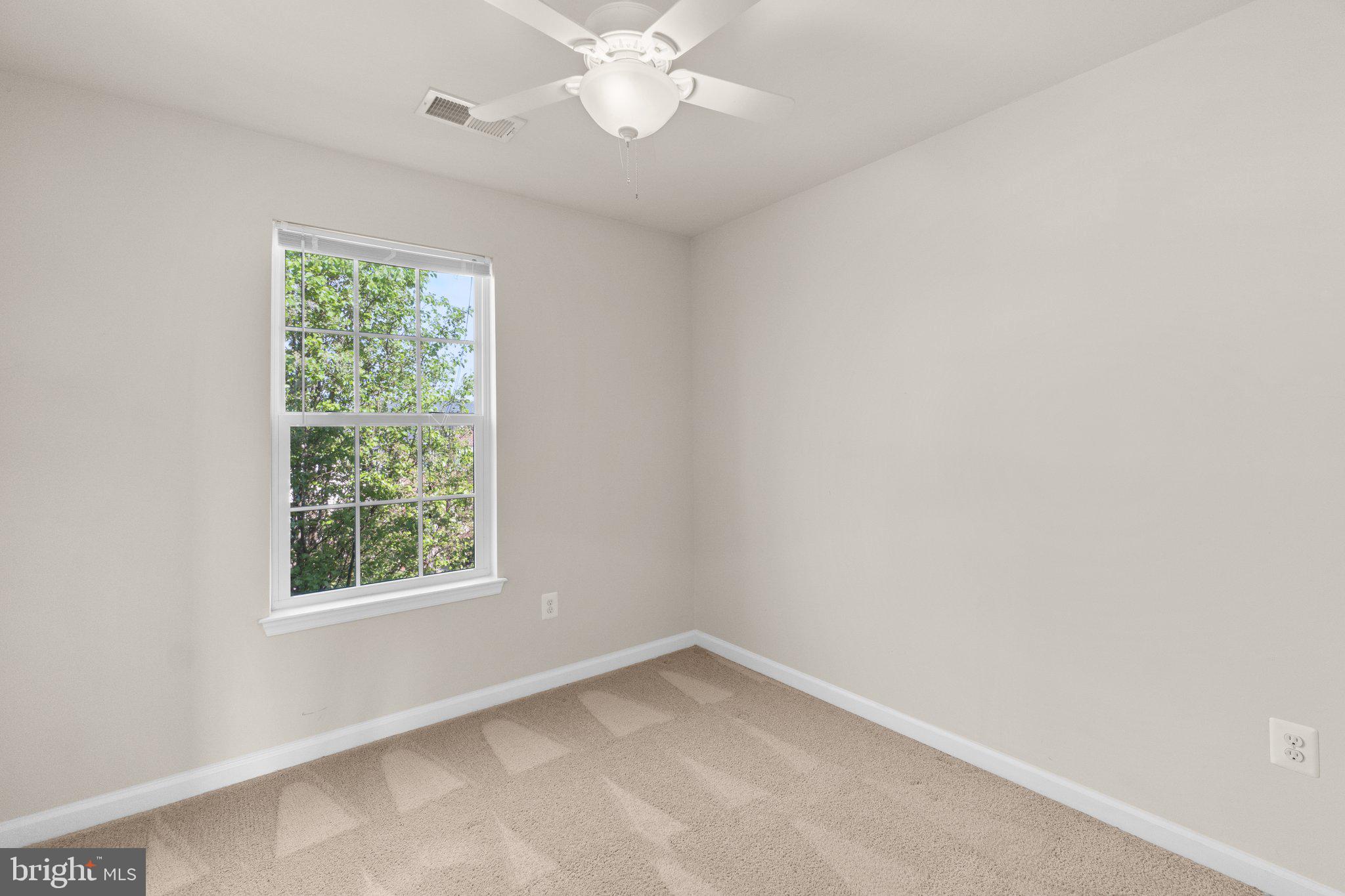 2061 Spring Run Circle Frederick, MD 21702 - Photo 23 of 42 an empty room with a window