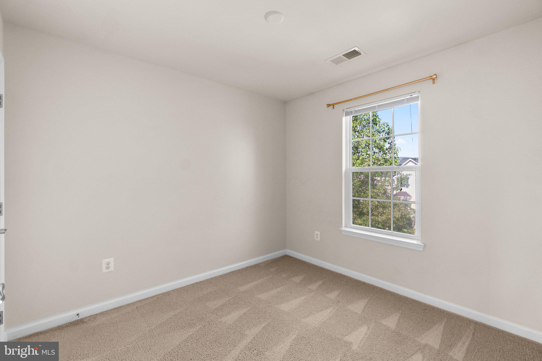 2061 Spring Run Circle Frederick, MD 21702 - Photo 26 of 42 an empty room with a window