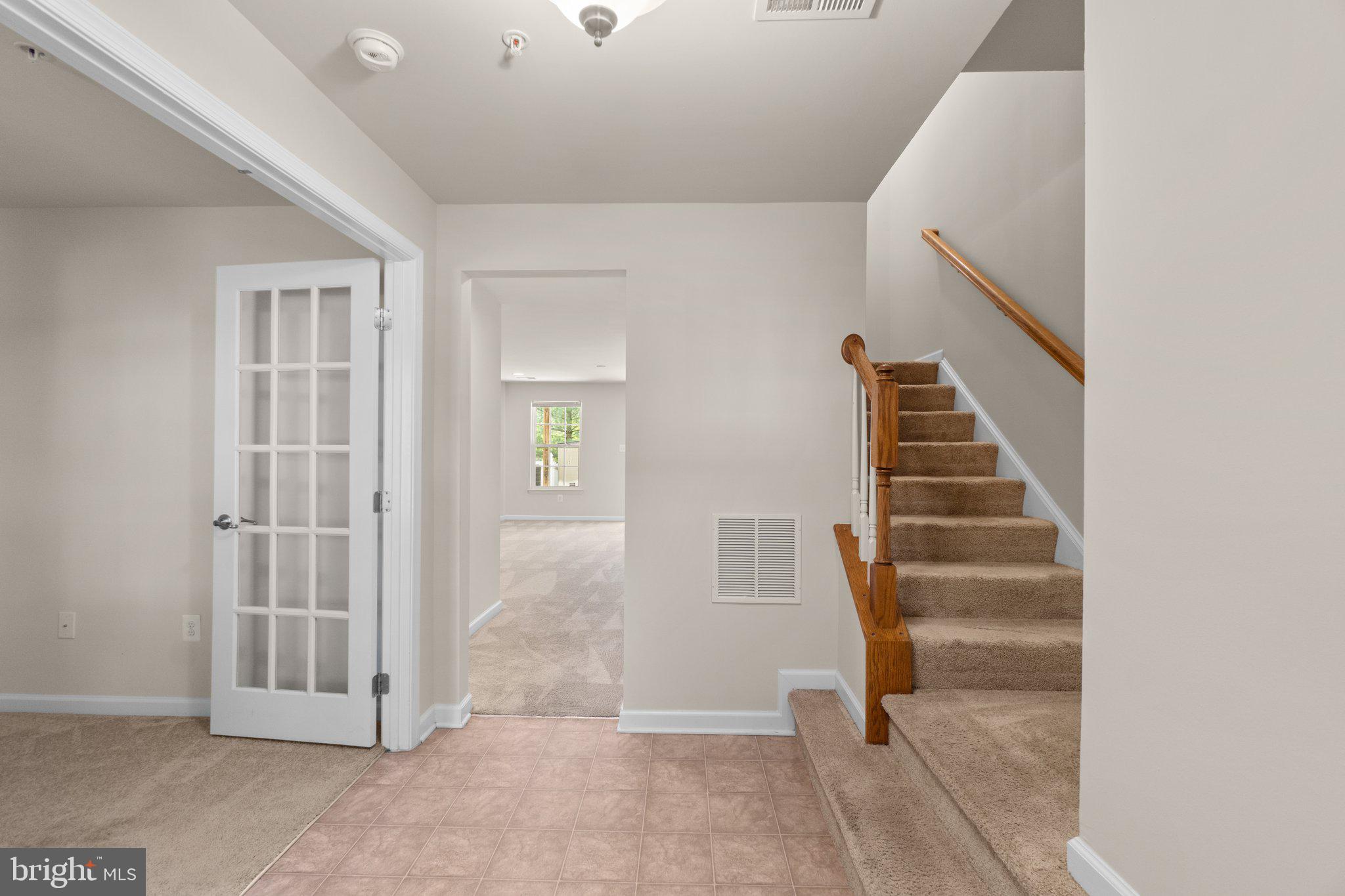 2061 Spring Run Circle Frederick, MD 21702 - Photo 29 of 42 a view of entryway with wooden floor