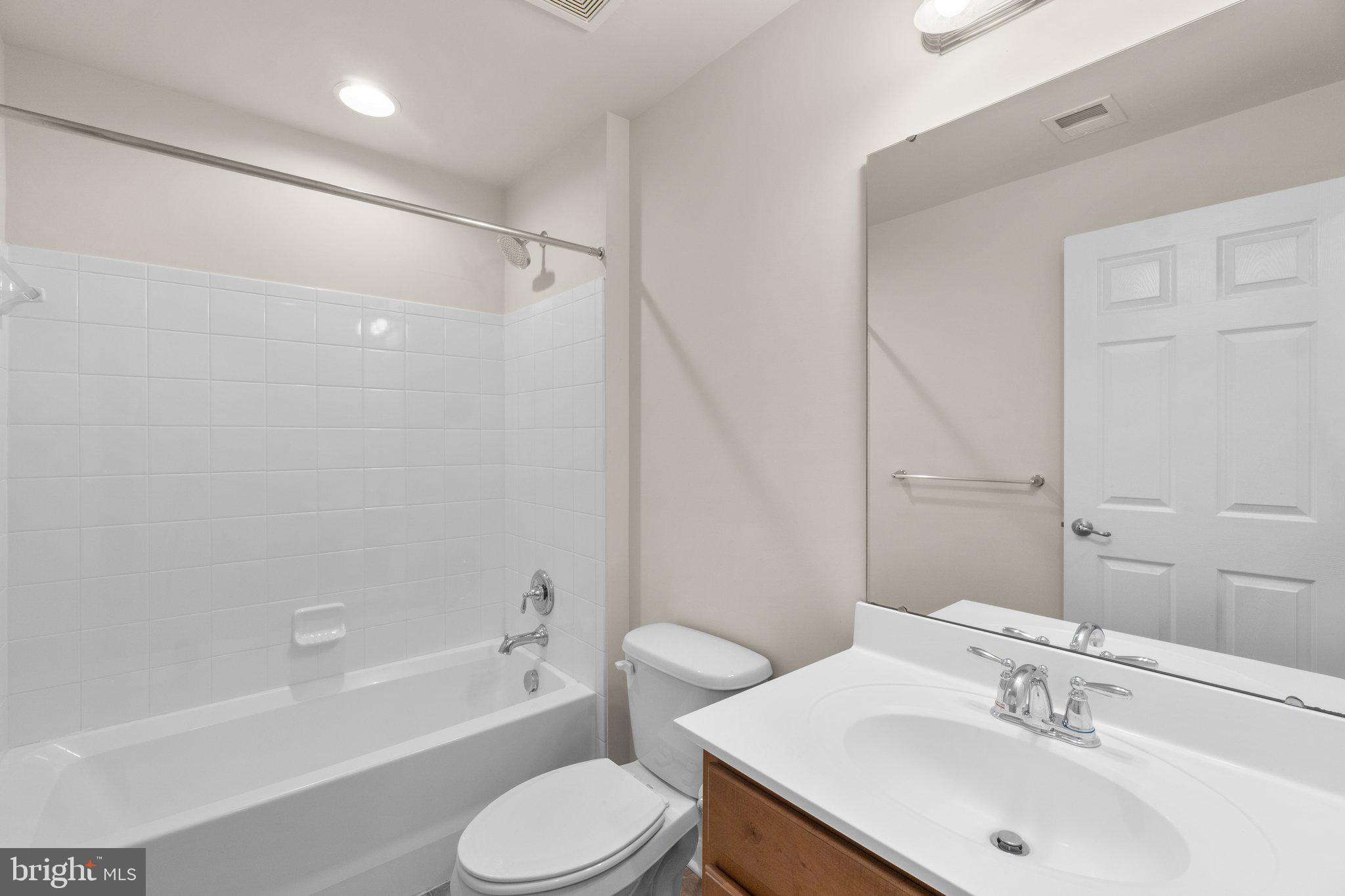 2061 Spring Run Circle Frederick, MD 21702 - Photo 33 of 42 a bathroom with a sink toilet and bathtub