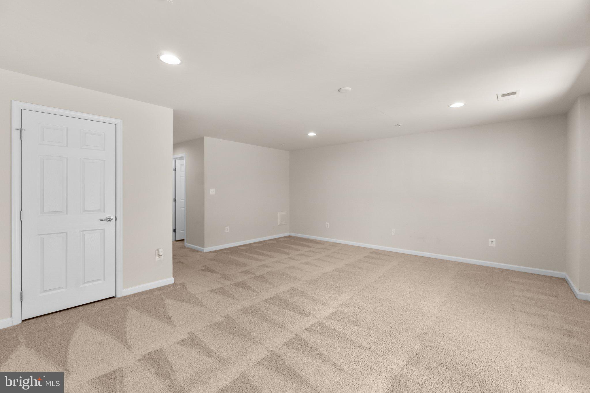 2061 Spring Run Circle Frederick, MD 21702 - Photo 36 of 42 an empty room with a natural light