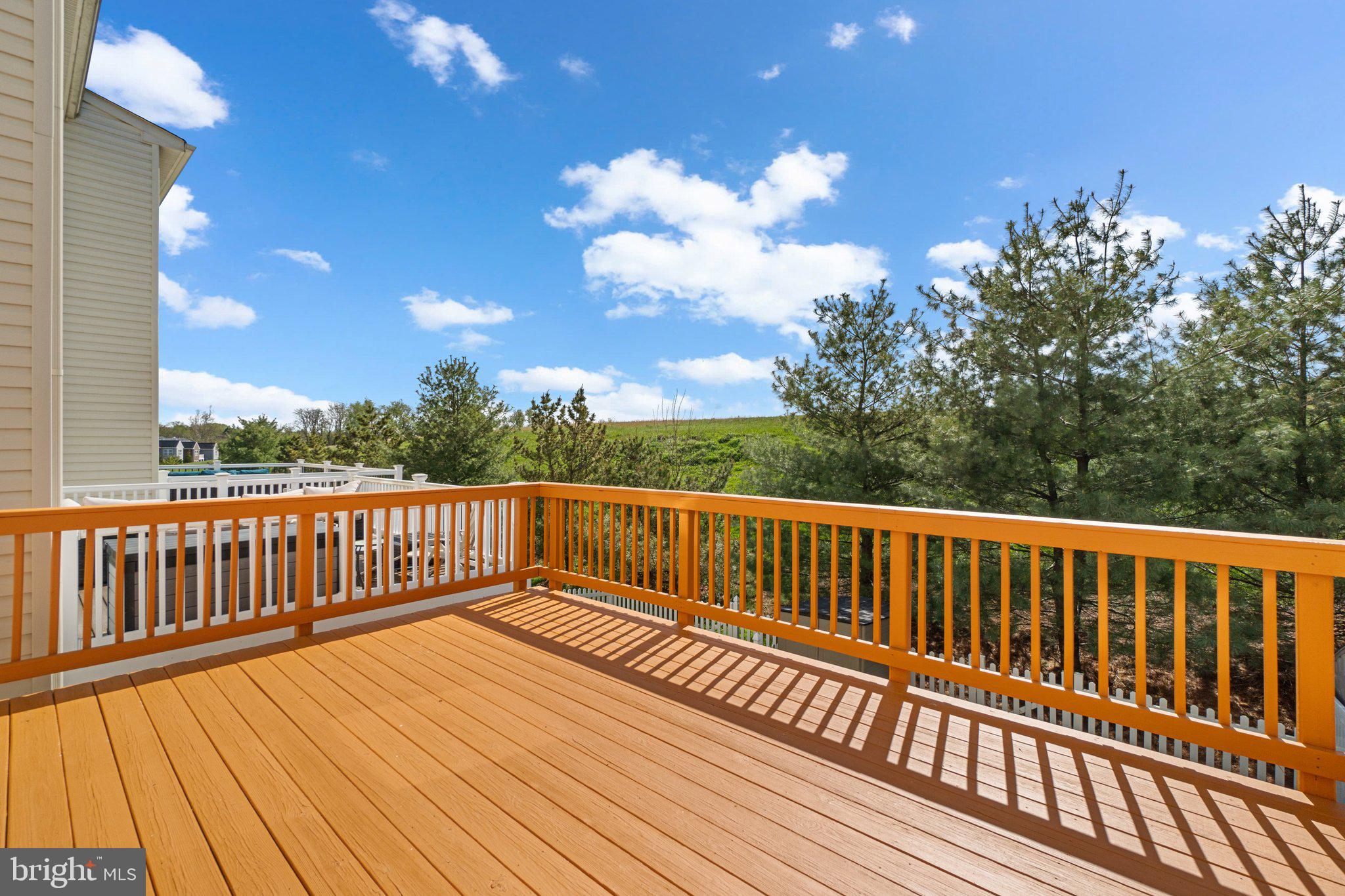 2061 Spring Run Circle Frederick, MD 21702 - Photo 37 of 42 a view of balcony with wooden floor