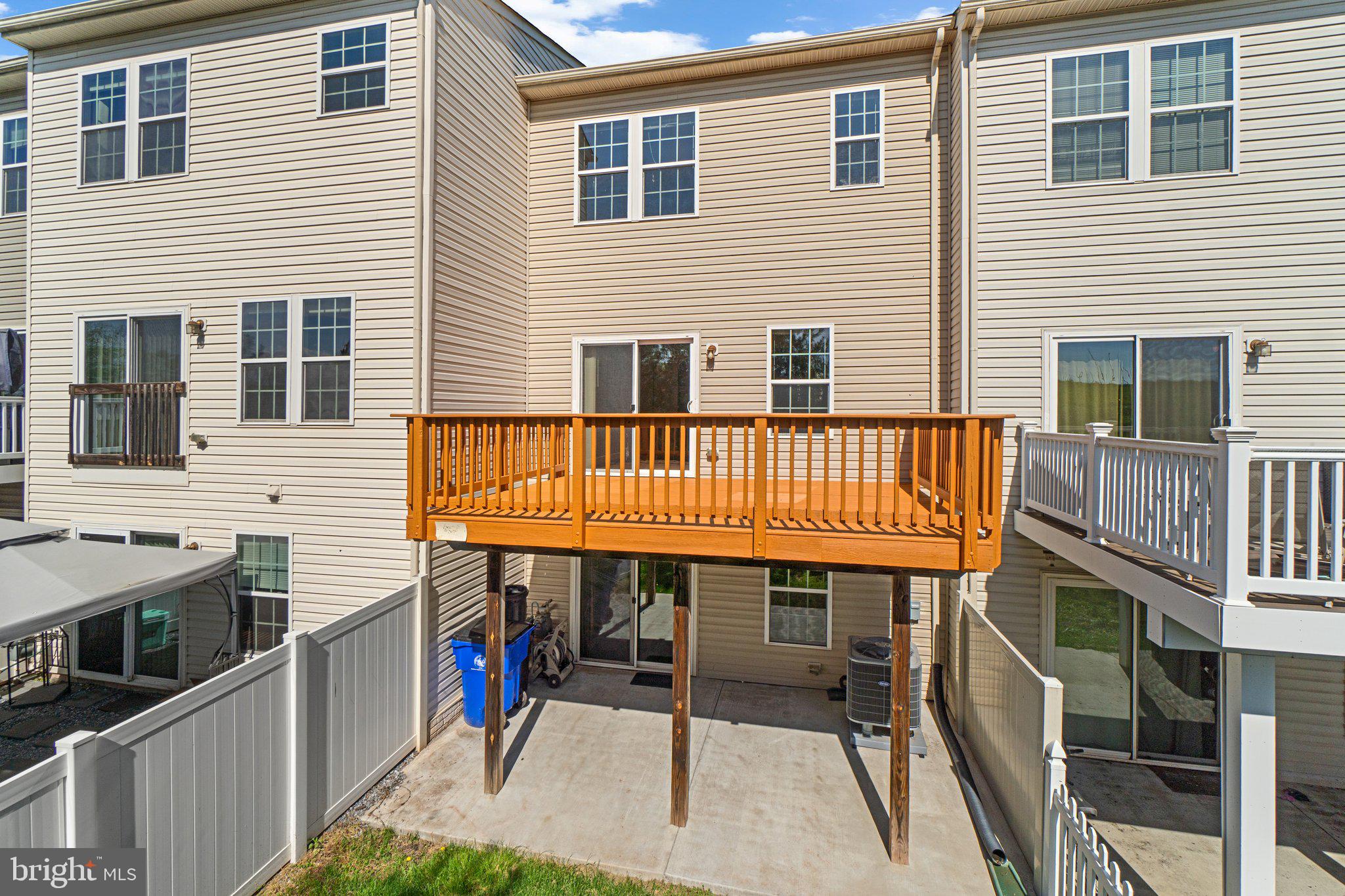 2061 Spring Run Circle Frederick, MD 21702 - Photo 38 of 42 a view of a house with a deck and furniture