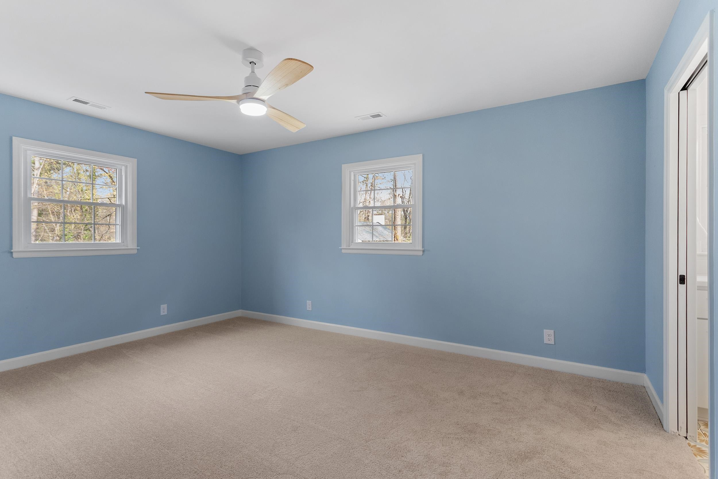 2906 Buckingham Road Durham, NC 27707 - Photo 22 of 34 a view of an empty room with a window