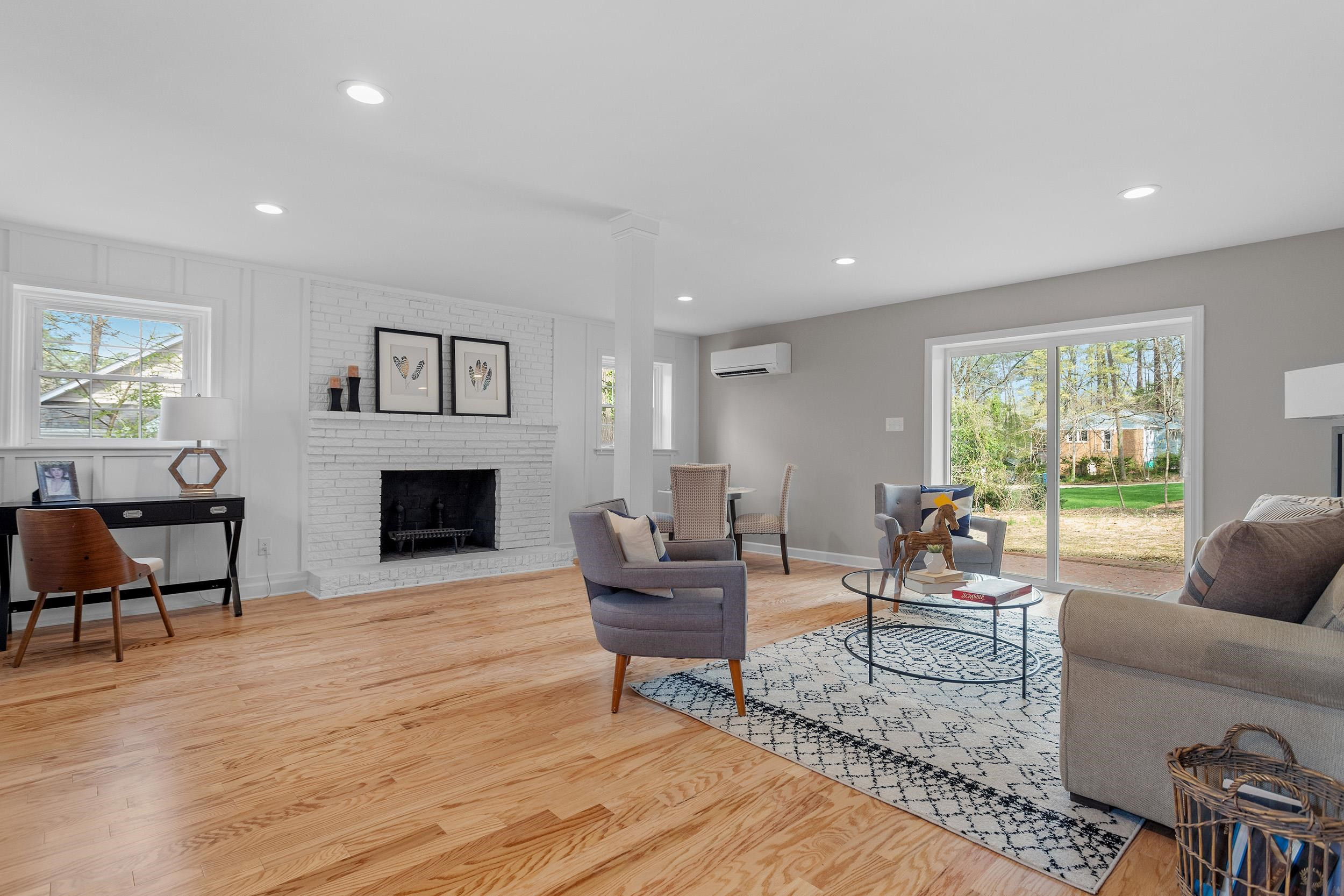 2906 Buckingham Road Durham, NC 27707 - Photo 26 of 34 a living room with furniture and a fireplace