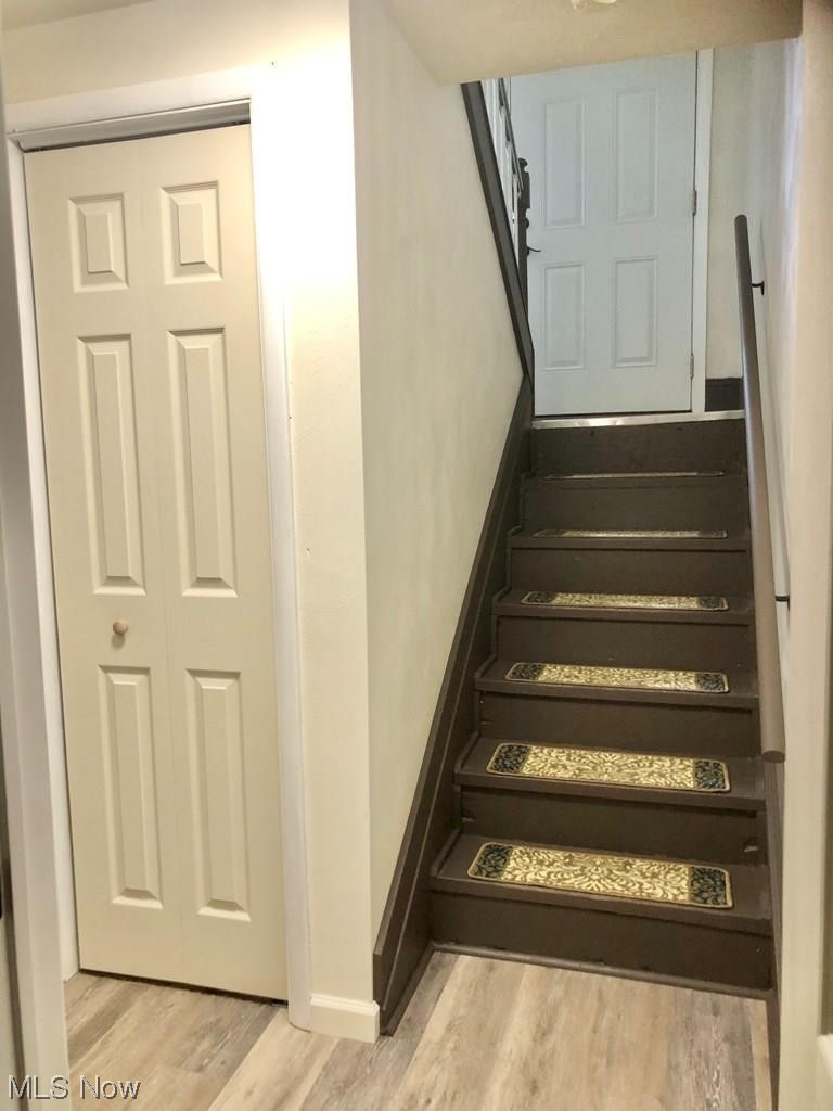 756 Northview Road Wellsburg, WV 26070 - Photo 16 of 25 Stairway featuring light hardwood floors