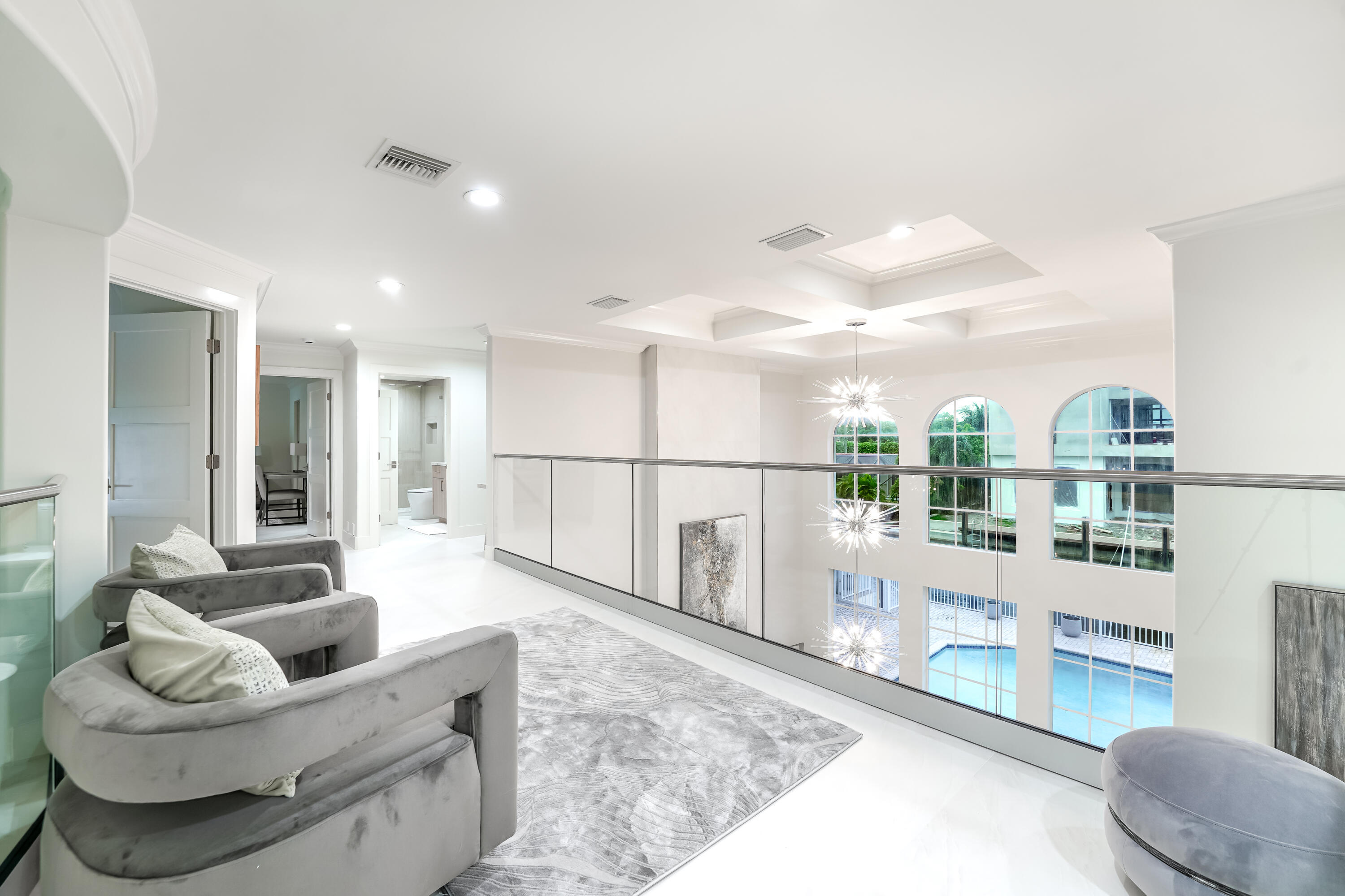 749 Northeast 71st Street Boca Raton, FL 33487 - Photo 25 of 43 a living room with furniture and a floor to ceiling window
