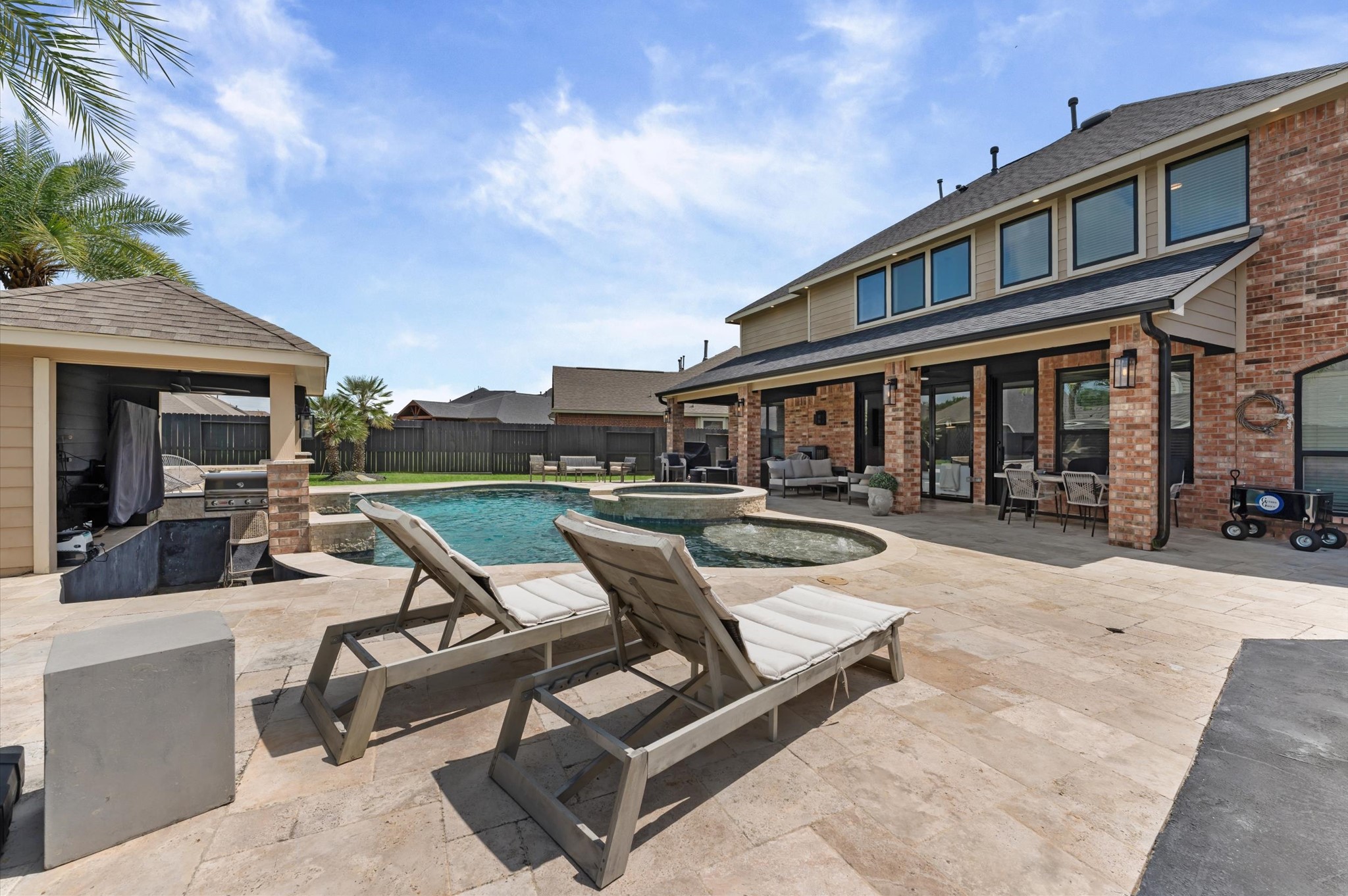 14016 Savannah Landing Lane Rosharon, TX 77583 - Photo 41 of 49 a view of a house with swimming pool and sitting area