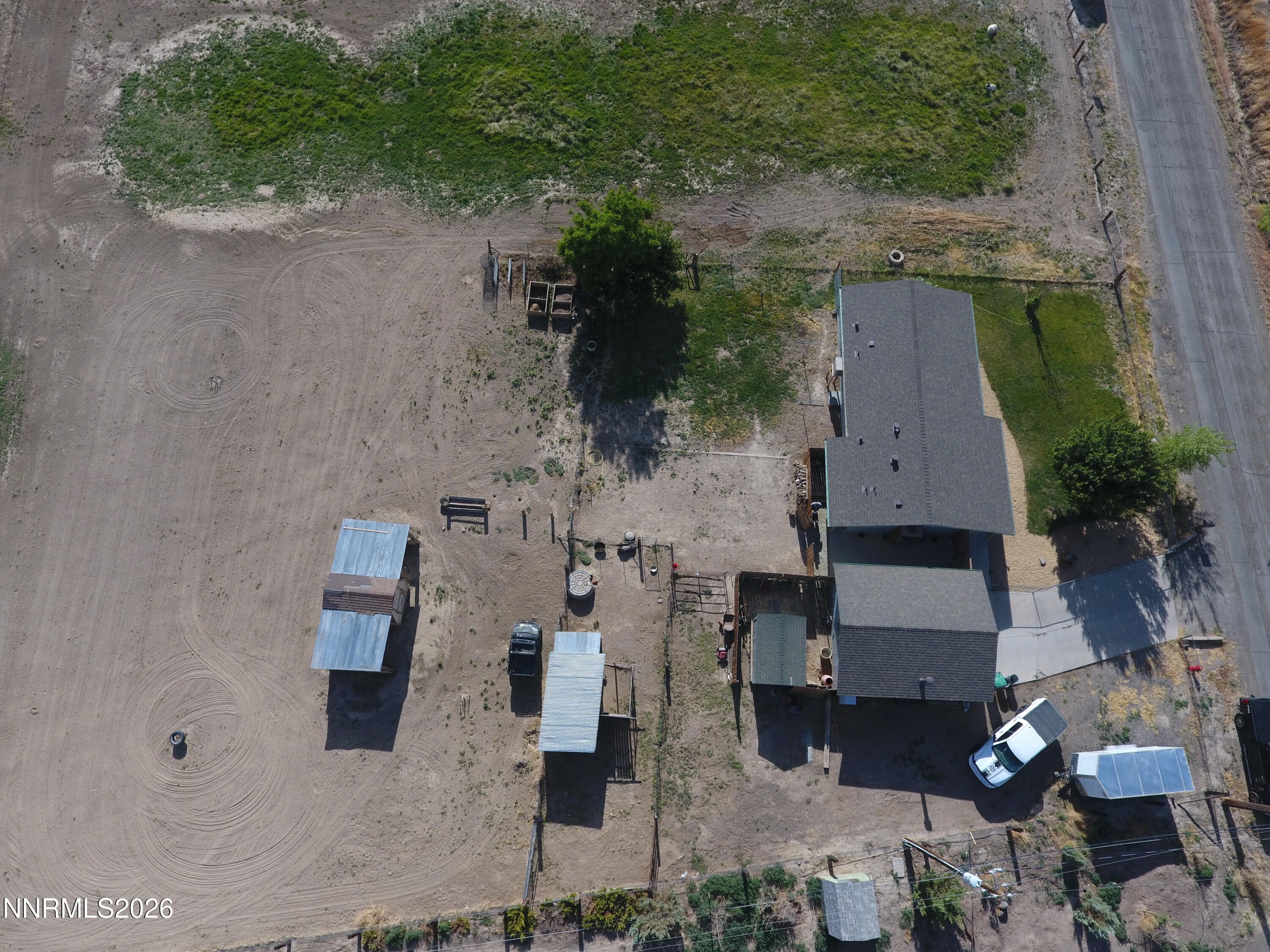 1125 Rancho Road Fernley, NV 89408 - Photo 5 of 47 an aerial view of multiple houses with outdoor space
