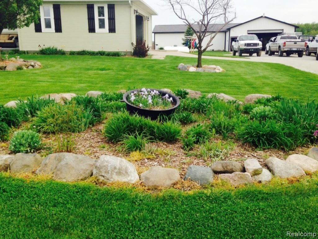 12735 Dunn Road Memphis, MI 48041 - Photo 3 of 31 front landscaping