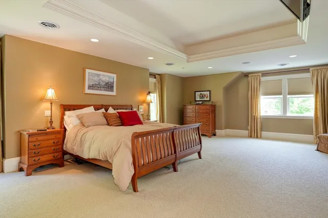 a bed room with furniture and a window