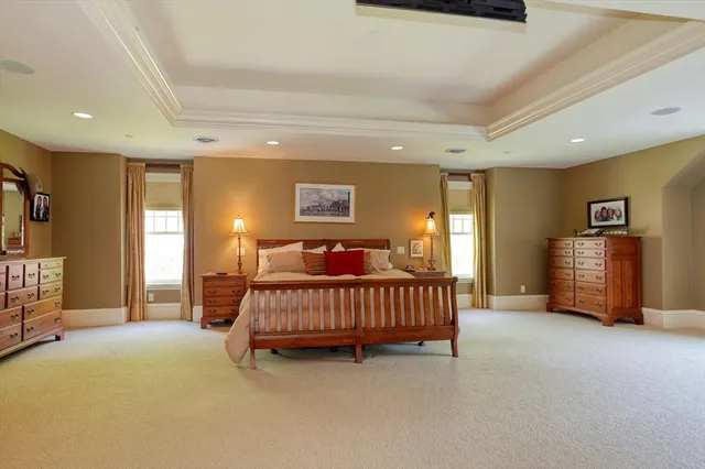a view of a bathroom with a granite countertop sink and a large mirror