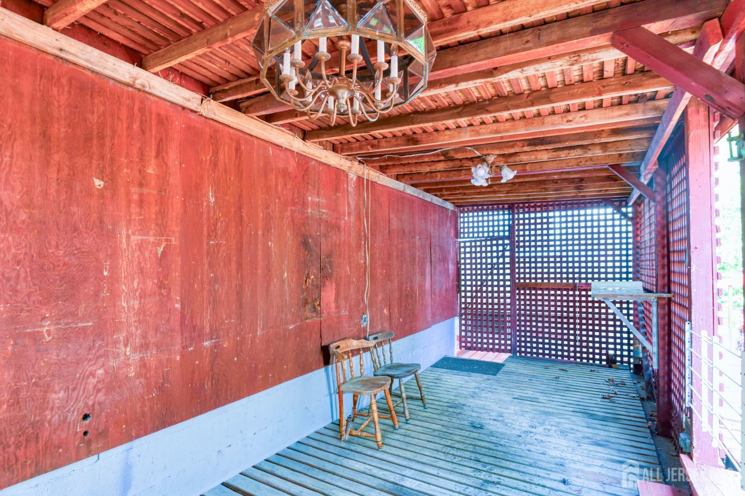 148 Helmetta Road Monroe Township, NJ 08831 - Photo 22 of 22 a view of a room with wooden walls