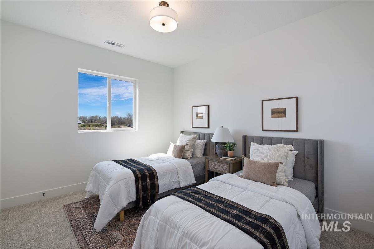 749 South Calhoun Lane Star, ID 83669 - Photo 31 of 34 Bedroom with carpet floors