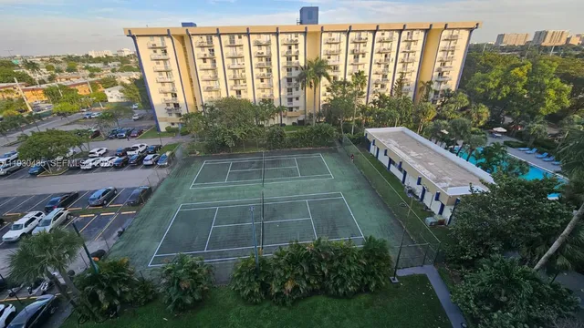 a view of a balcony with plants