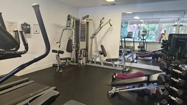 a view of a room with gym equipment