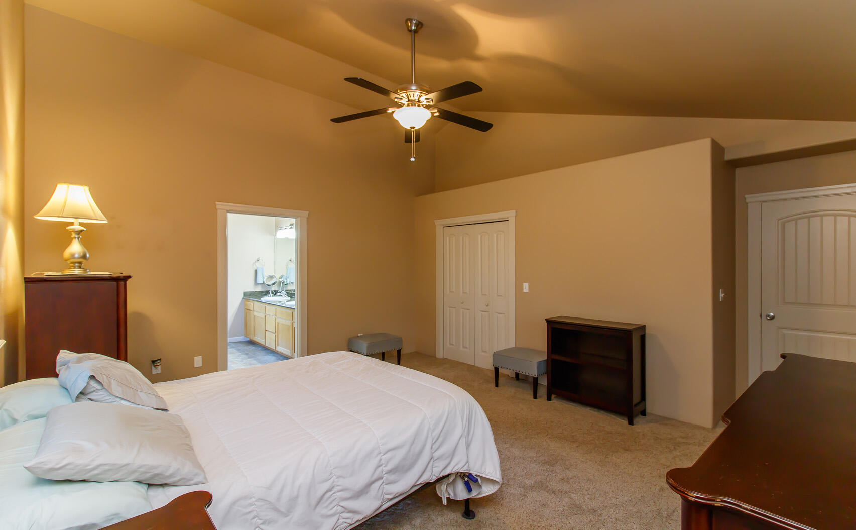 1955 Rabun Way Central Point, OR 97502 - Photo 14 of 33 a bedroom with a bed and a chandelier