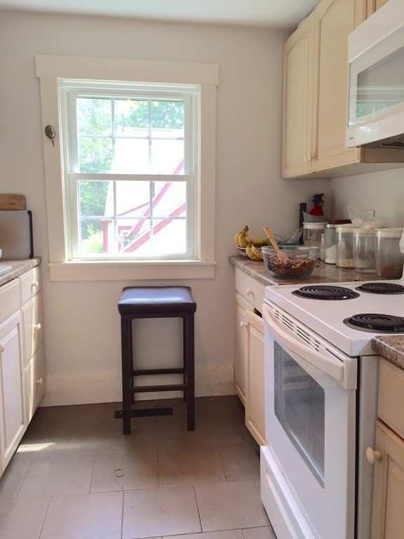 84-86 East Leverett Road Amherst, MA 01002 - Photo 21 of 29 a kitchen with a stove and a sink