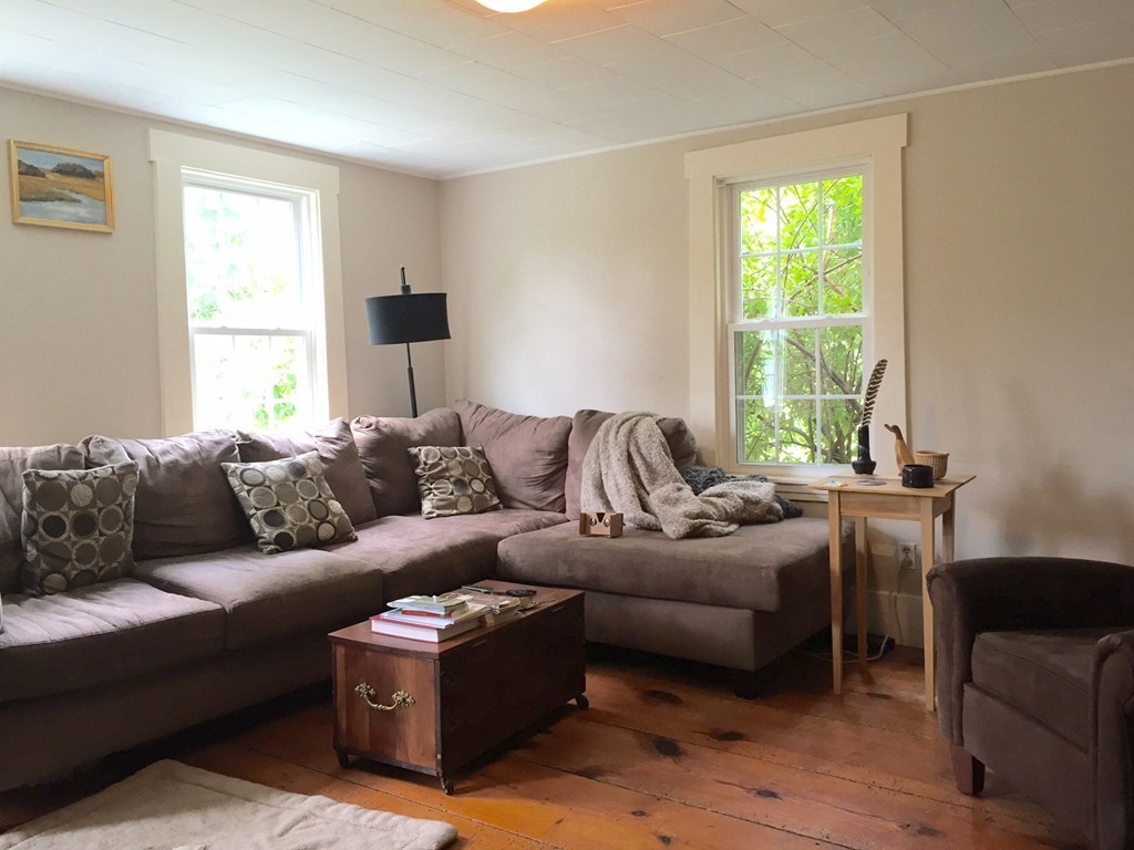84-86 East Leverett Road Amherst, MA 01002 - Photo 27 of 29 a living room with furniture and a window
