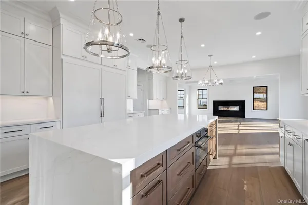 a large kitchen with a large island in it