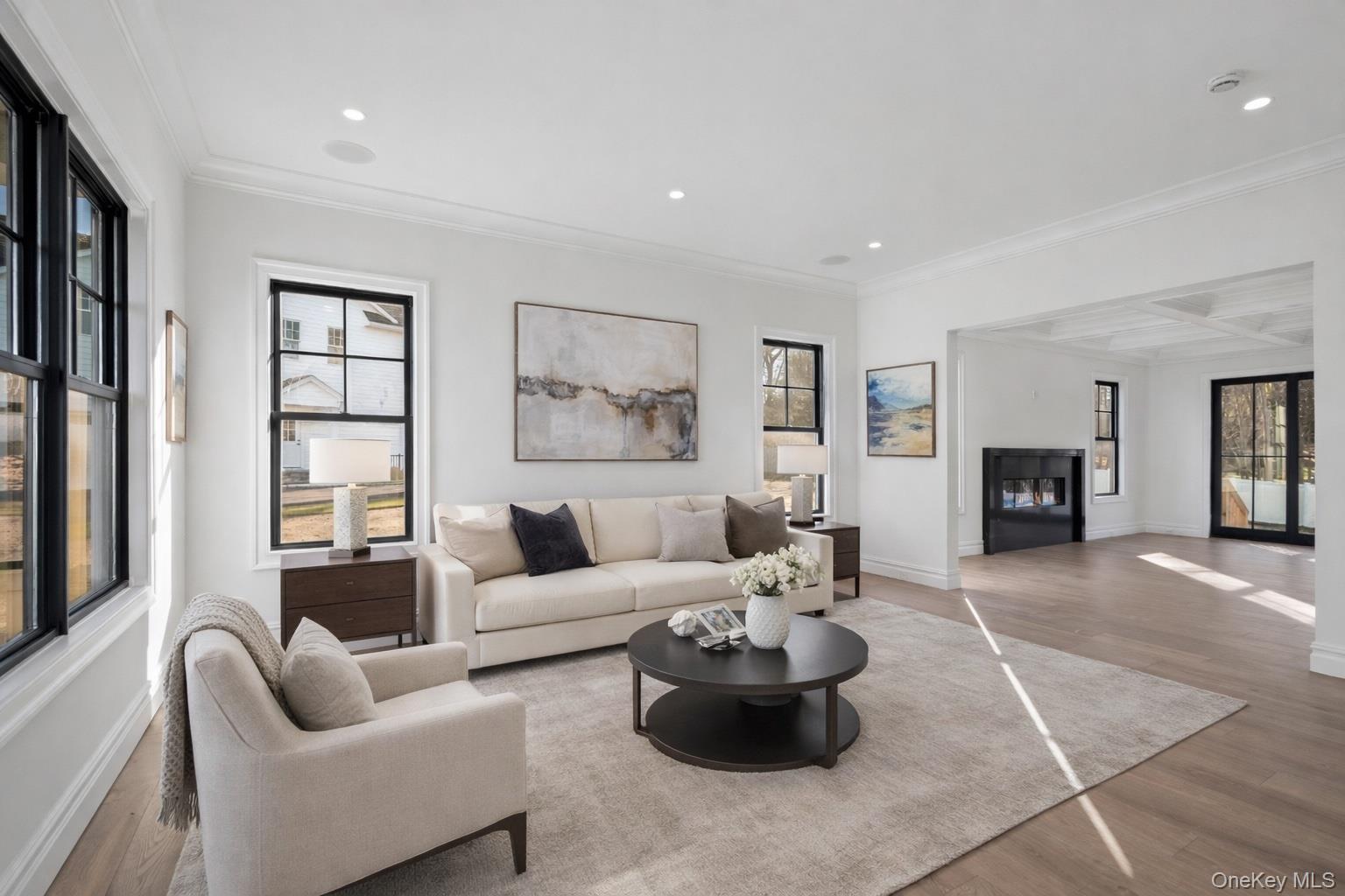 30 Main Parkway Plainview, NY 11803 - Photo 10 of 30 a living room with furniture and a large window