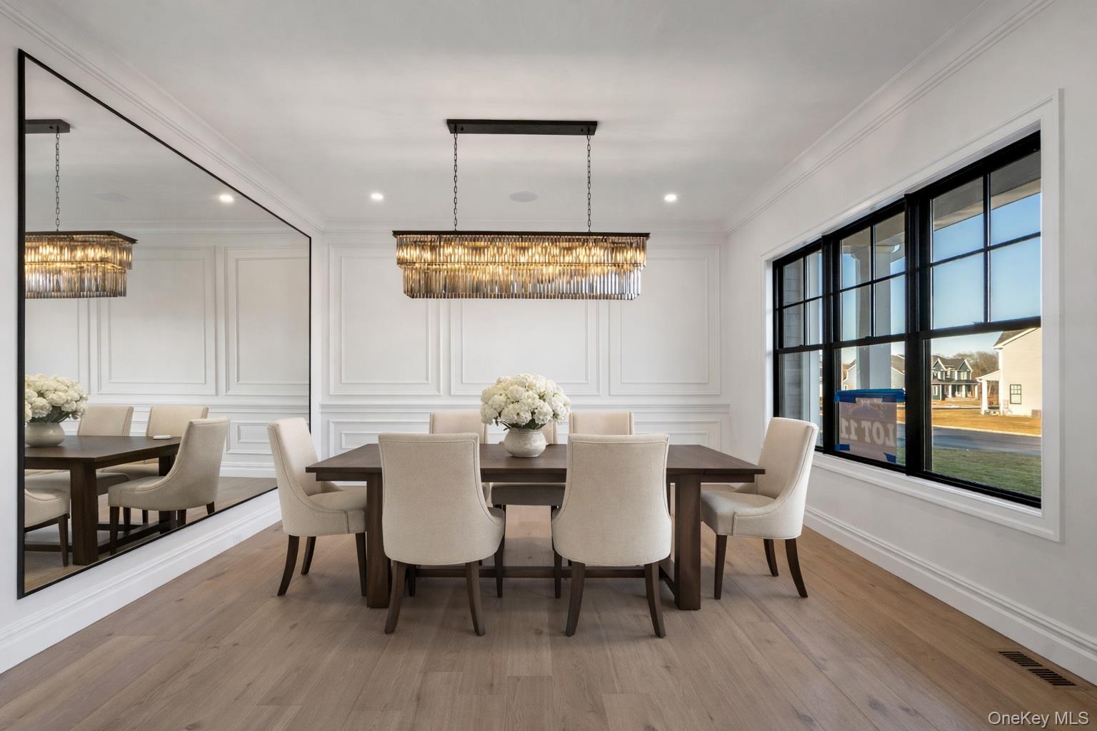 30 Main Parkway Plainview, NY 11803 - Photo 11 of 30 a view of a a dining room with furniture window and wooden floor