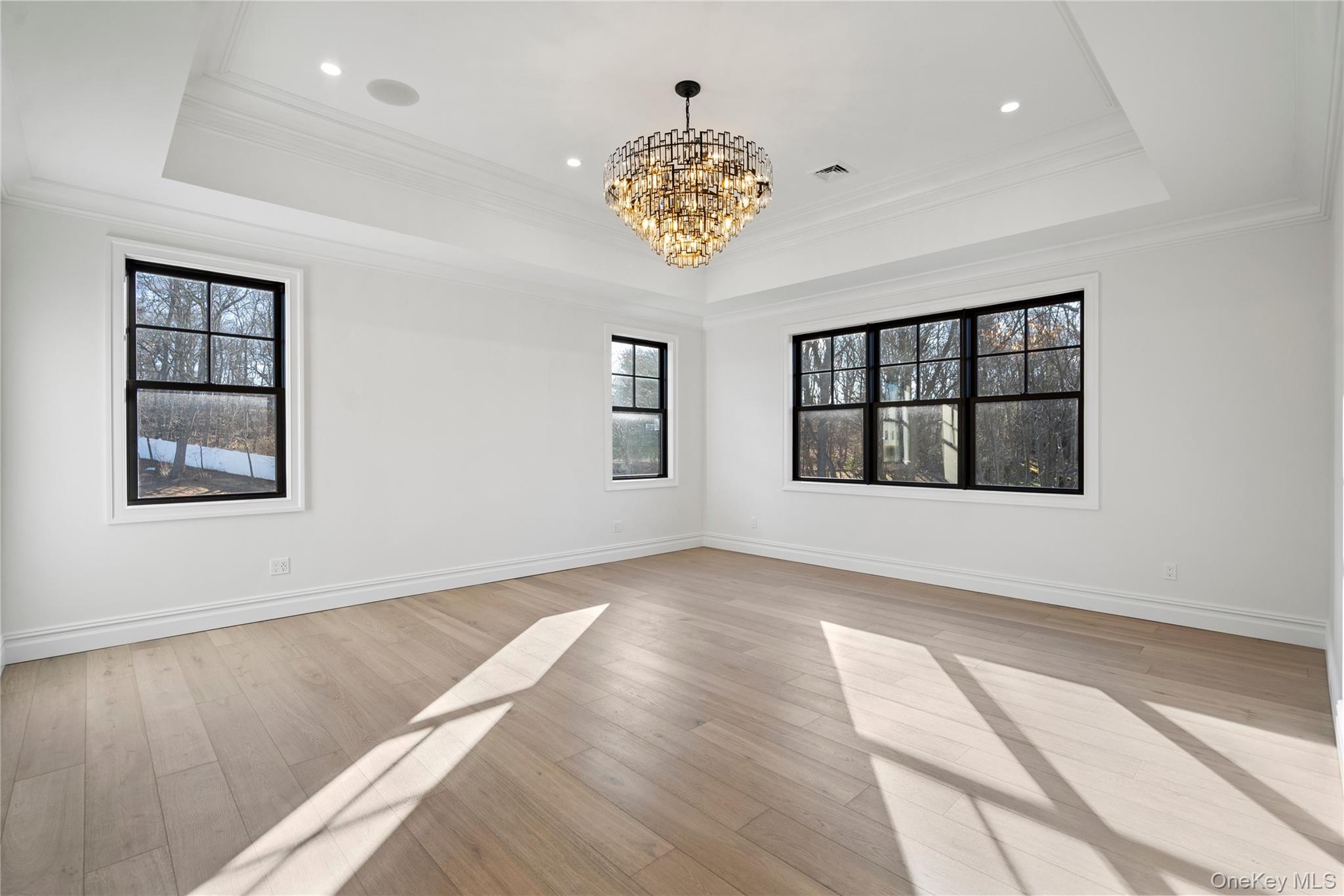 30 Main Parkway Plainview, NY 11803 - Photo 19 of 30 wooden floor in an empty room with a window