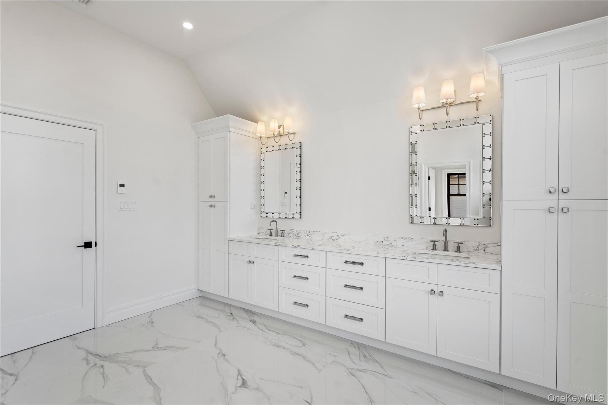 30 Main Parkway Plainview, NY 11803 - Photo 27 of 30 a spacious bathroom with double sink and a mirror