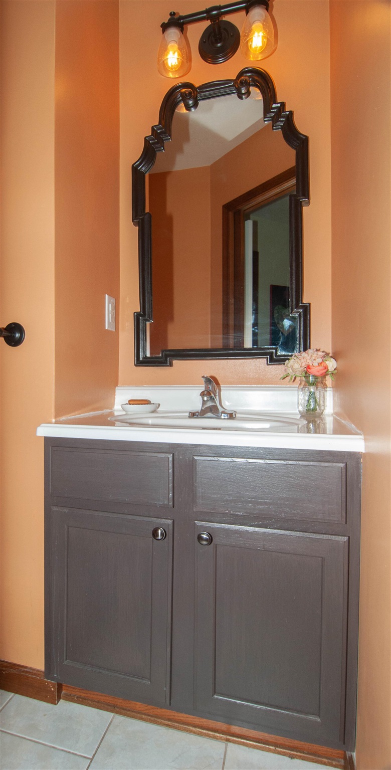 3155 Barterbrook Road Staunton, VA 24401 - Photo 17 of 59 a bathroom with a sink and a mirror