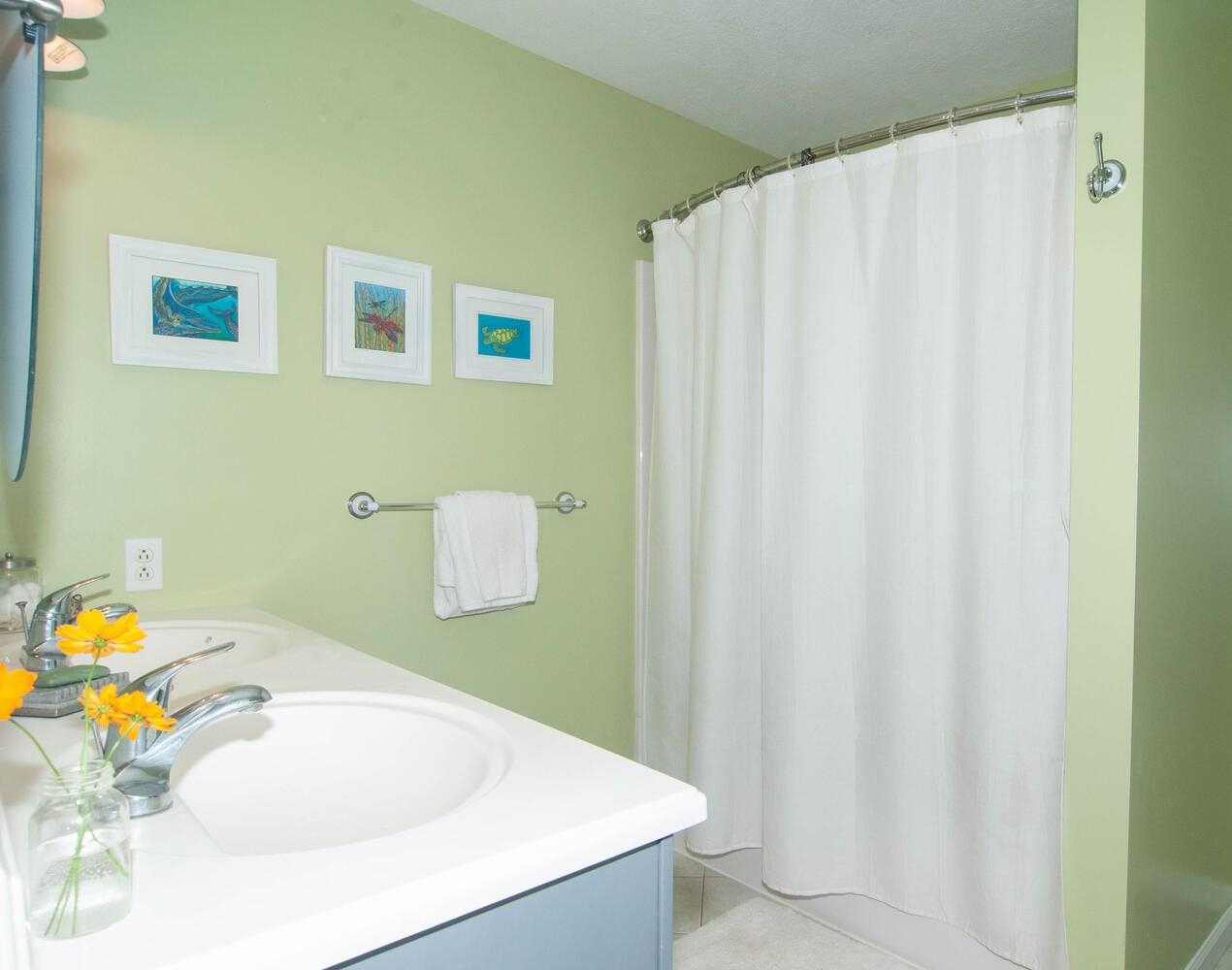 3155 Barterbrook Road Staunton, VA 24401 - Photo 21 of 59 a bathroom with a sink a tub and shower curtain