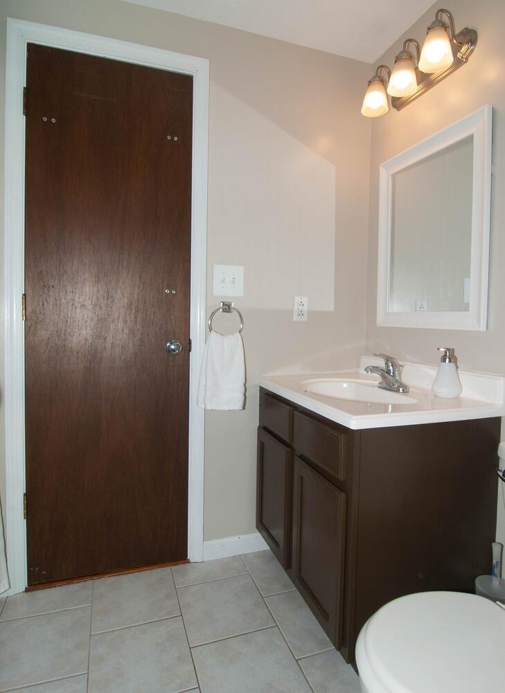 3155 Barterbrook Road Staunton, VA 24401 - Photo 26 of 59 a bathroom with a sink vanity and a mirror