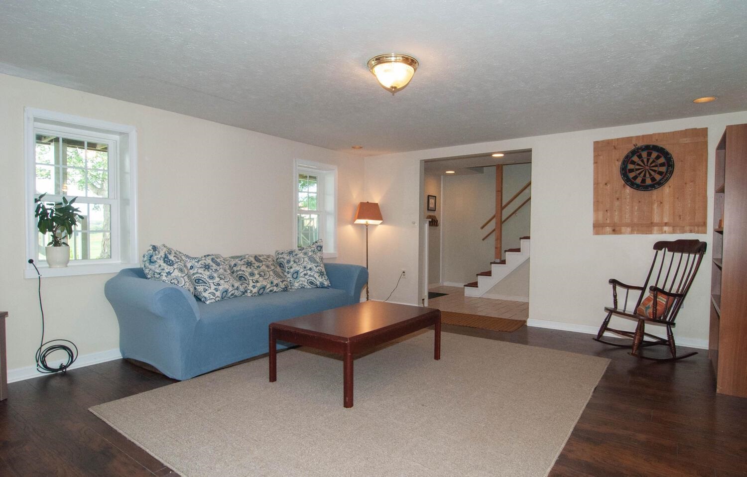 3155 Barterbrook Road Staunton, VA 24401 - Photo 29 of 59 a living room with furniture and a wooden floor