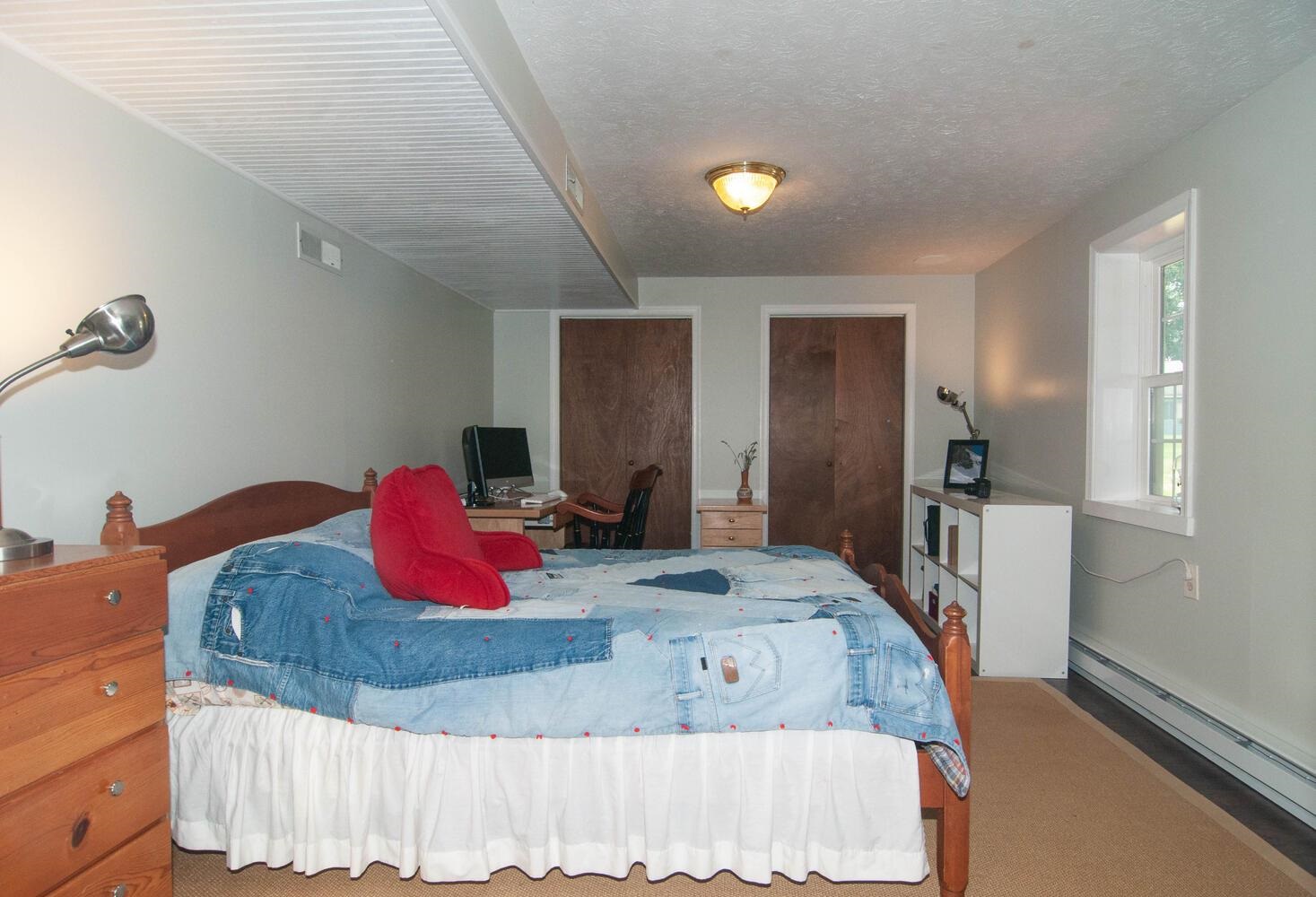 3155 Barterbrook Road Staunton, VA 24401 - Photo 32 of 59 a large bedroom with a bed and wooden floor