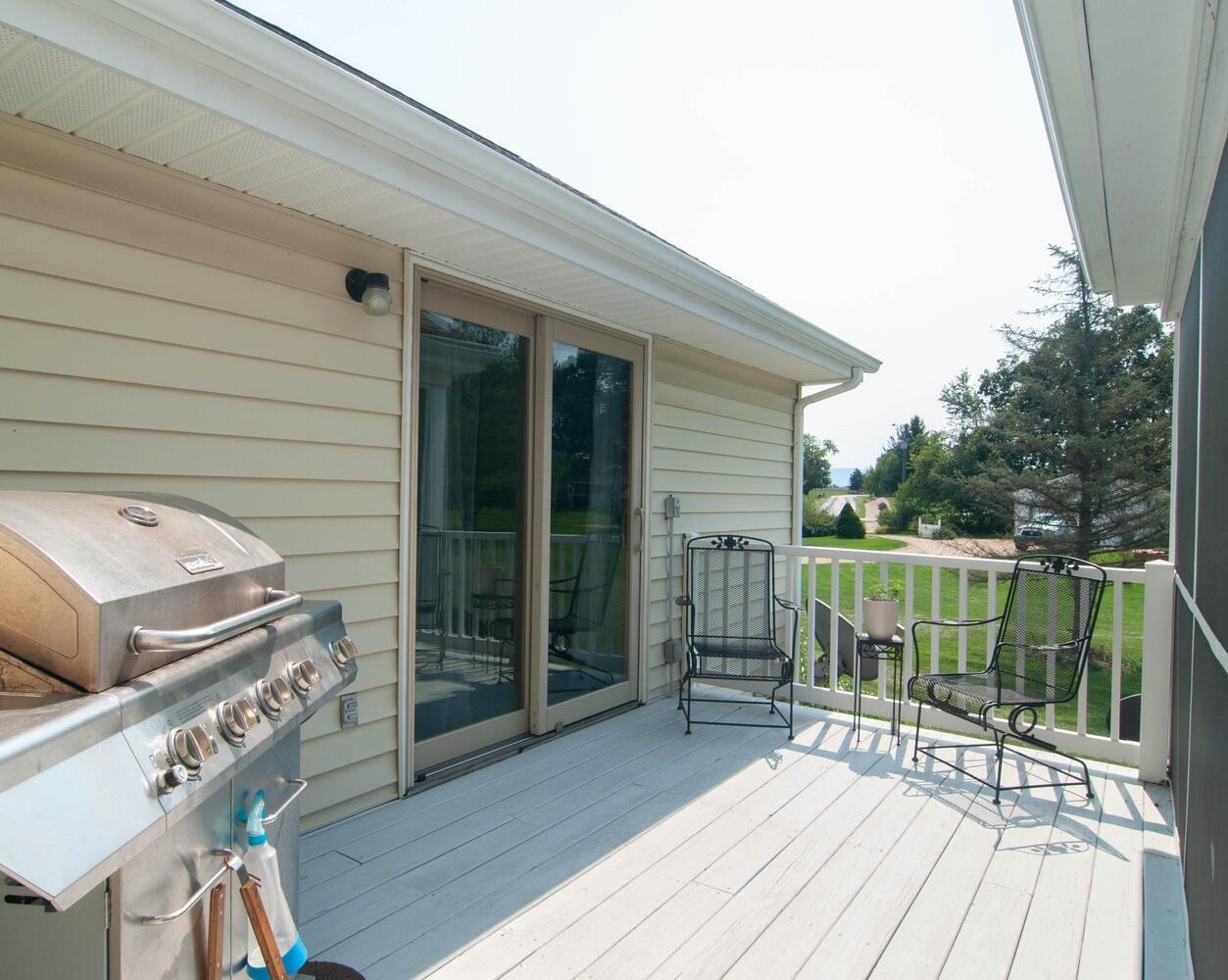 3155 Barterbrook Road Staunton, VA 24401 - Photo 43 of 59 a balcony with wooden floor table and chairs