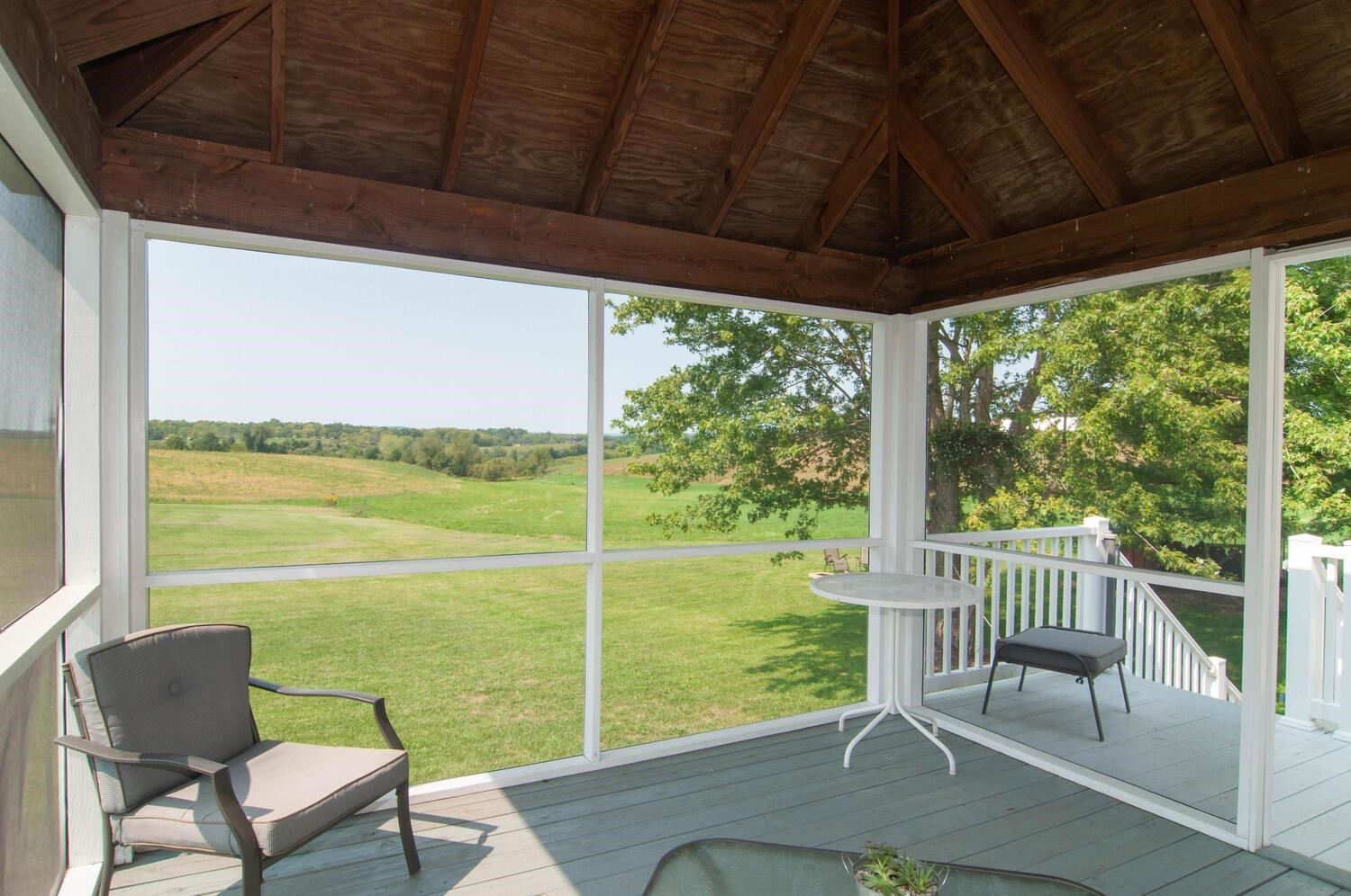 3155 Barterbrook Road Staunton, VA 24401 - Photo 47 of 59 a view of a chairs and table in the balcony