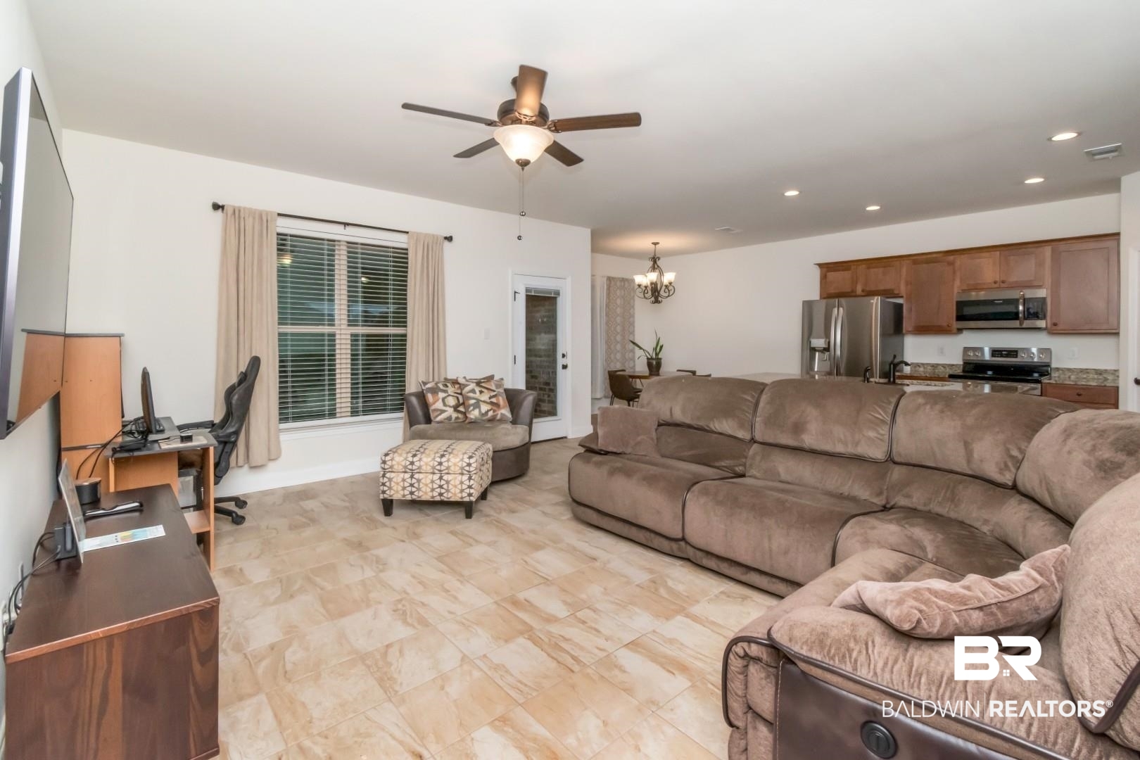 10714 Brodick Loop Spanish Fort, AL 36527 - Photo 11 of 26 Living area featuring ceiling fan, a chandelier, and recessed lighting
